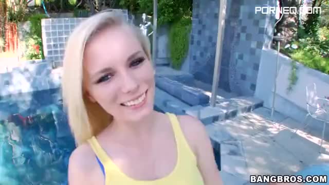 Cute blonde Elaina Raye licks and rubs a dick on the poolside