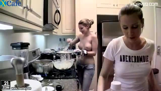 Delicious busty blond student cooks tasty dinner for her GF with bare tits