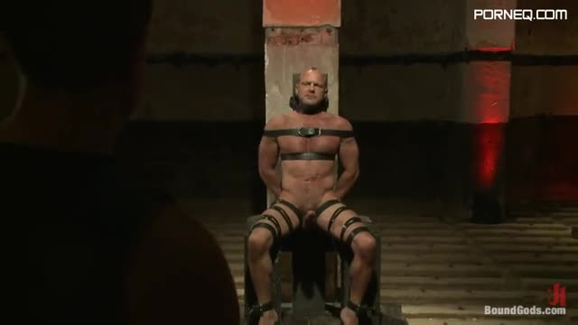 Bald Hunk Tied With Leather Belts And Fucked In The Mouth