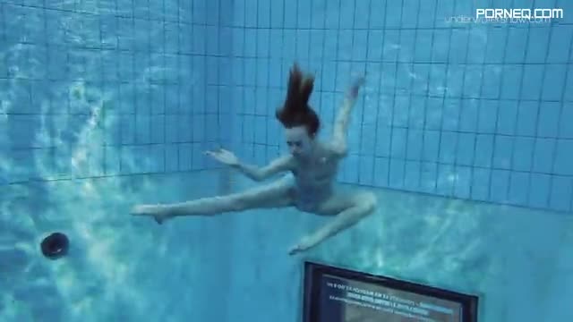 Super slender girl showing off her beauty underwater