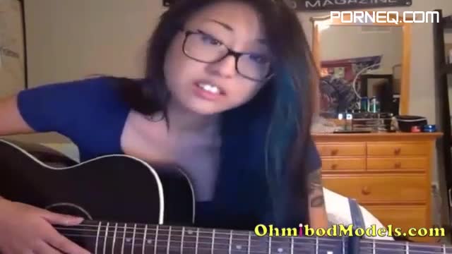 Cute Nude Nerdy Asian Girl with Glasses and Guitar