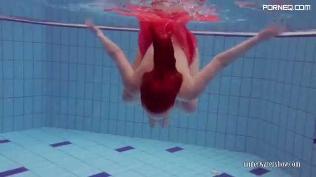 Redhead girl Privsem in red silk dress shows nude body underwater