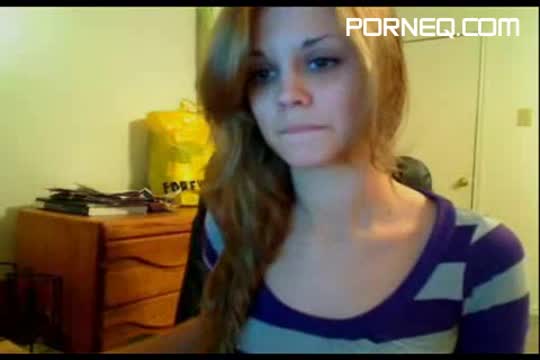 A hot redhead teenie in webcam action